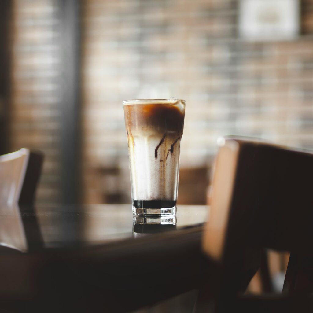 pexels-photo-16284352-16284352 Close-up of a Glass of Iced Coffee Standing on a Table